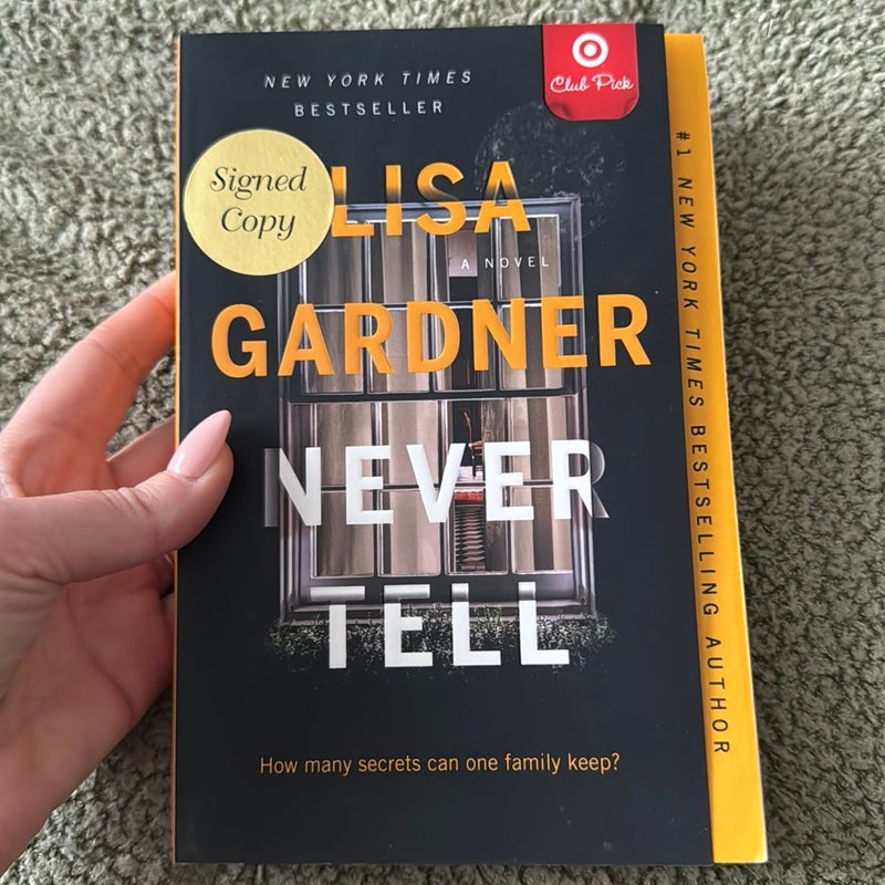 Never Tell (SIGNED)