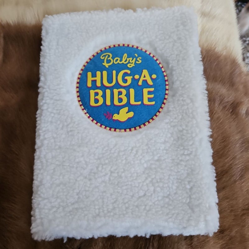 Baby's hug a bible