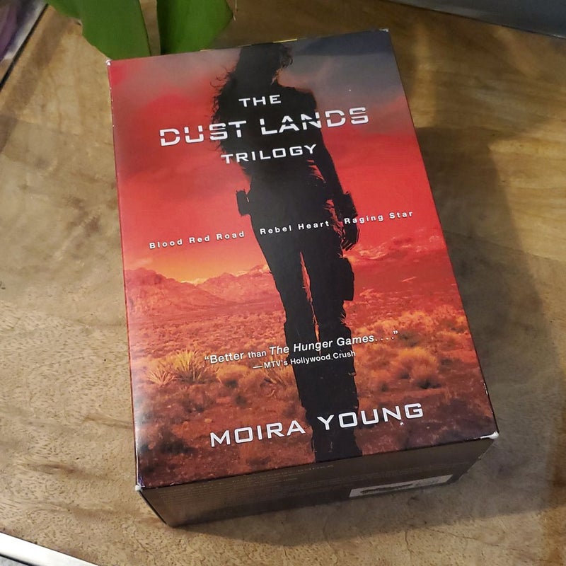 The Dust Lands Trilogy by Moira Young, Paperback | Pangobooks The Dust Lands Trilogy by Moira Young, Paperback | Pangobooks