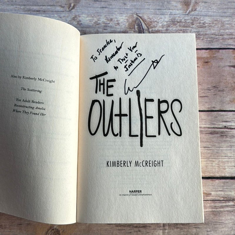 The Outliers-signed 