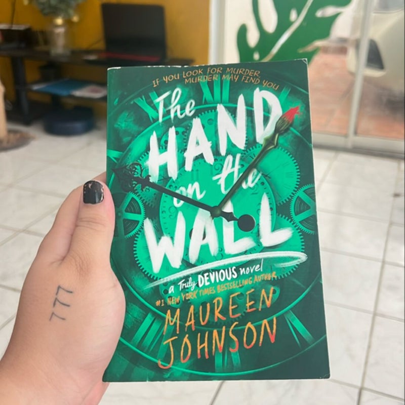 The Hand on the Wall