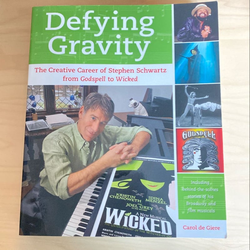 Defying Gravity Signed