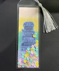 Handmade shaker bookmark with Colleen Hoover titles 