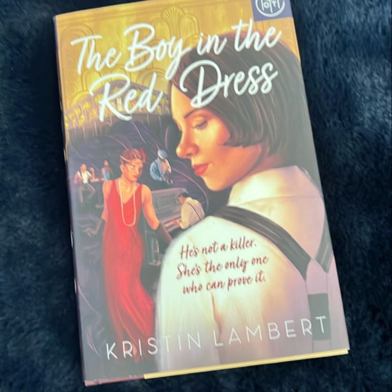 The Boy in the Red Dress