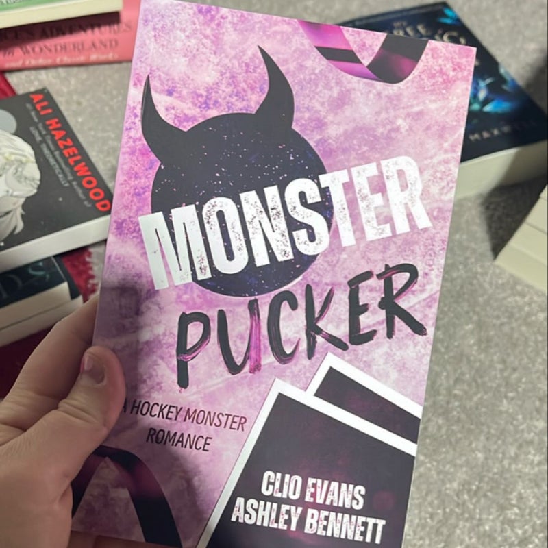 Monster Pucker: a MMF Monster Hockey Romance