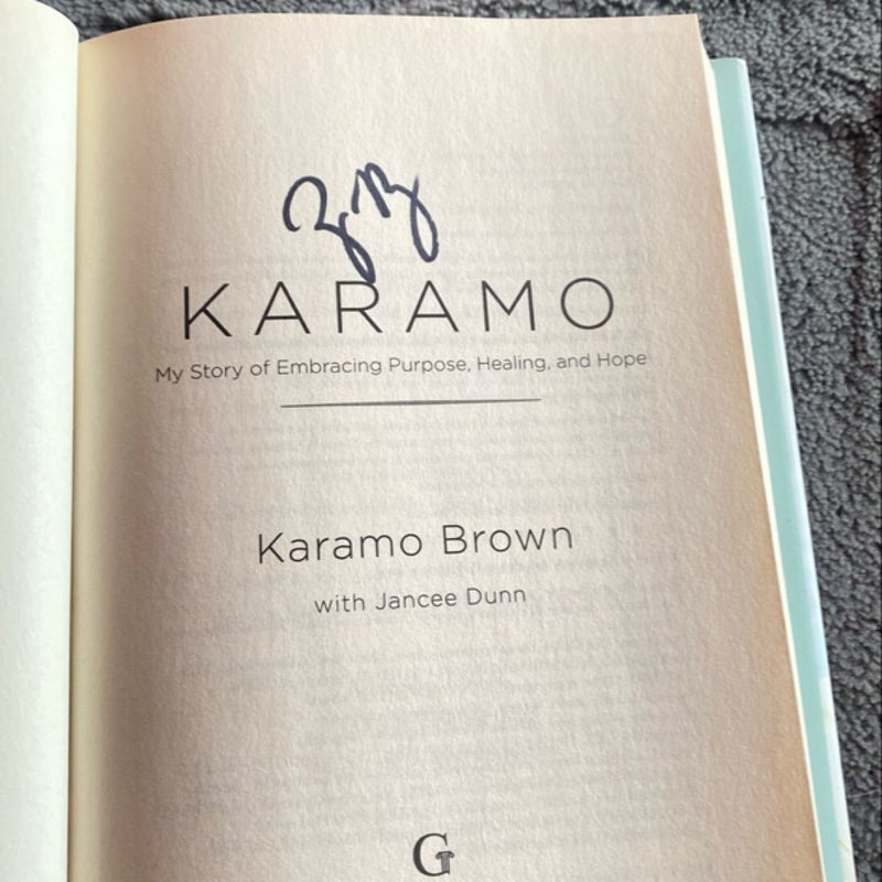 Karamo *signed*