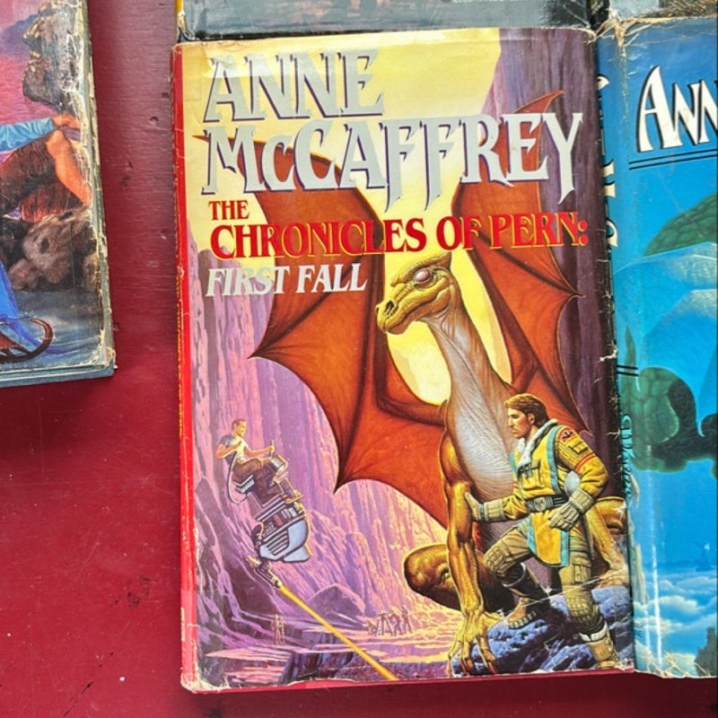 5 Hardcover Pern Books: first fall, renegades, Harper Hall of Pern, nerilka’s story, weyrs of pern. 