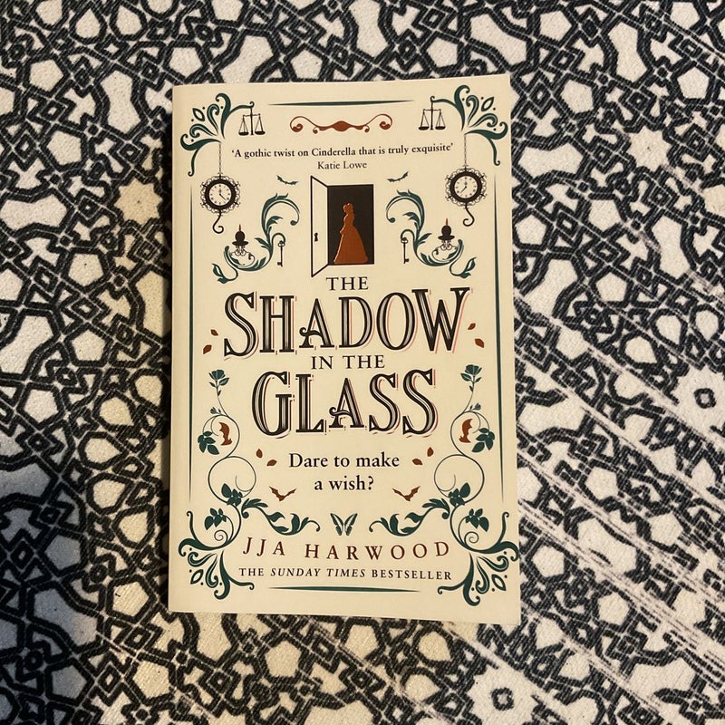The Shadow in the Glass