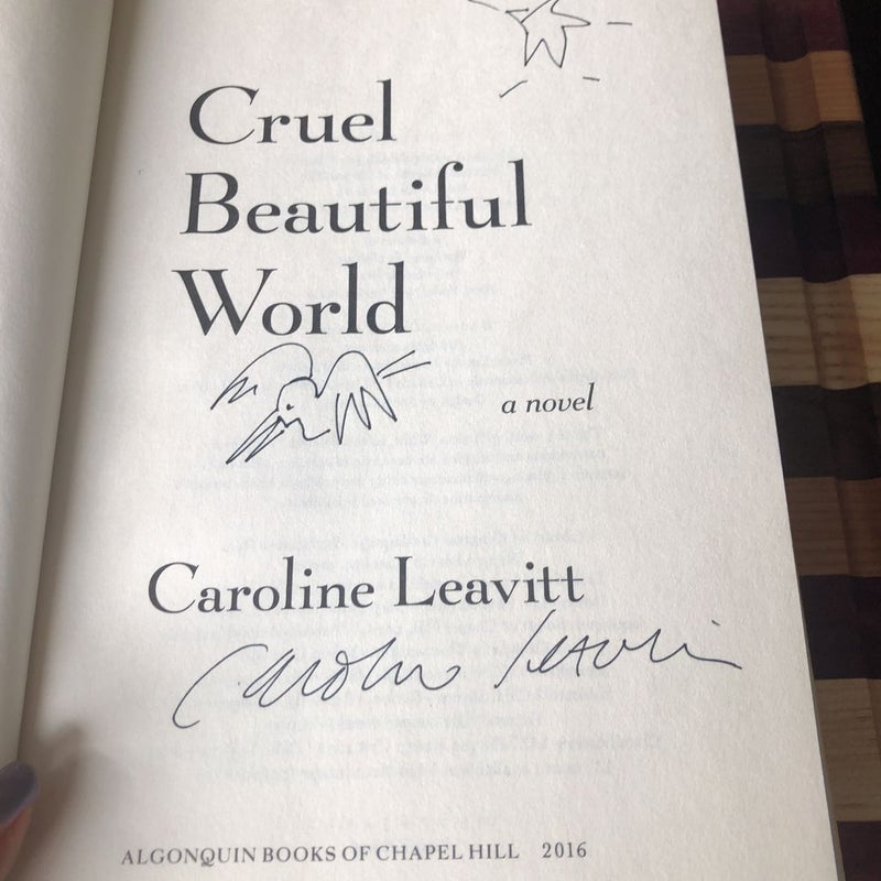 Cruel Beautiful World (signed copy)