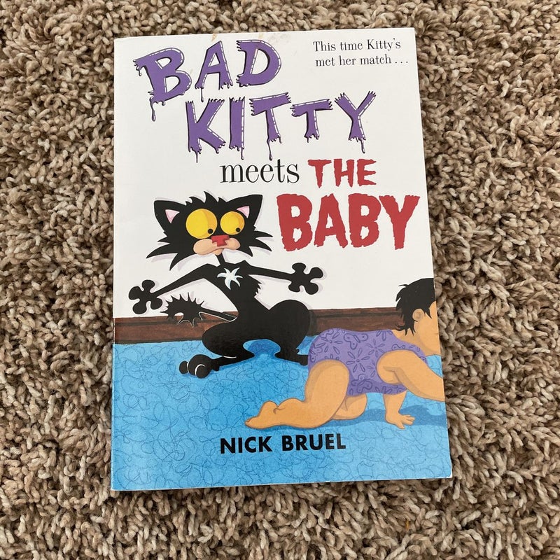 Bad kitty meets the baby