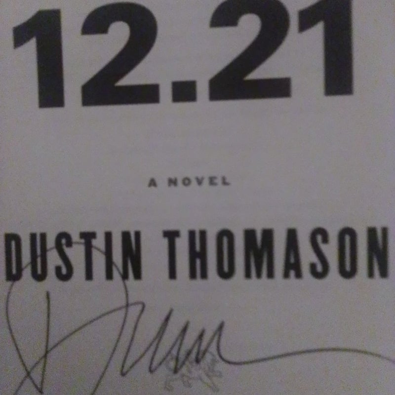 New Signed 12 21 by Dustin Thomason