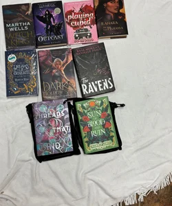 Box with 9 books and 13 goodies from Bookish box, Illumicrate,  Fairyloot, Faecrate and Owlcrate. 