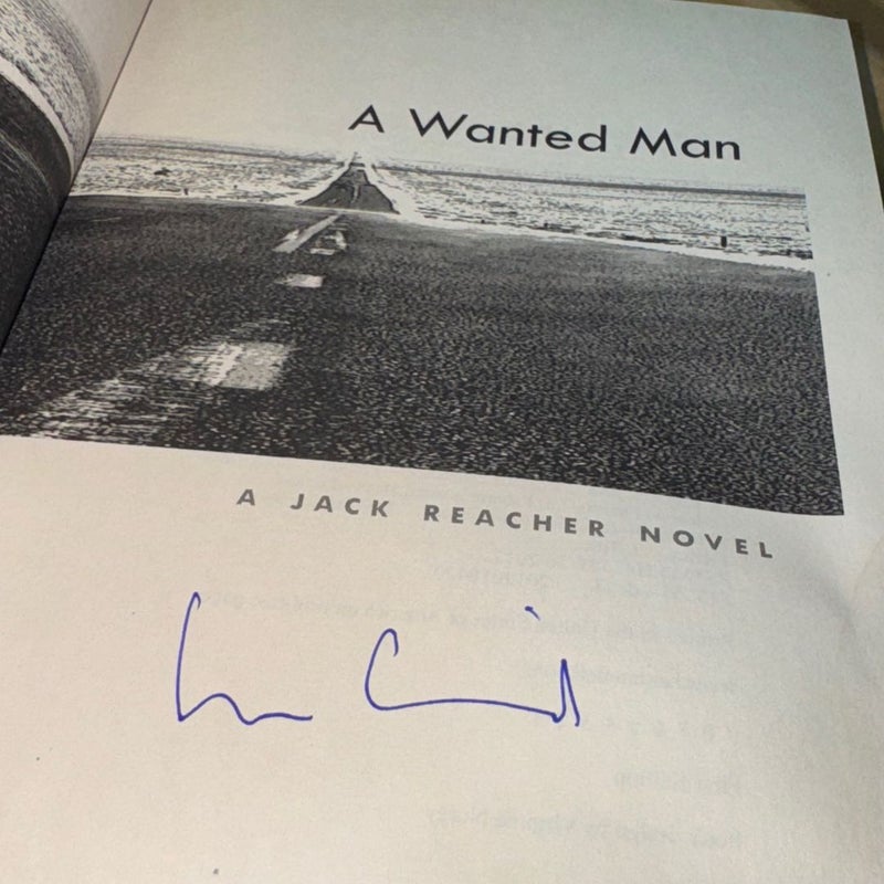 A WANTED MAN SIGNED 