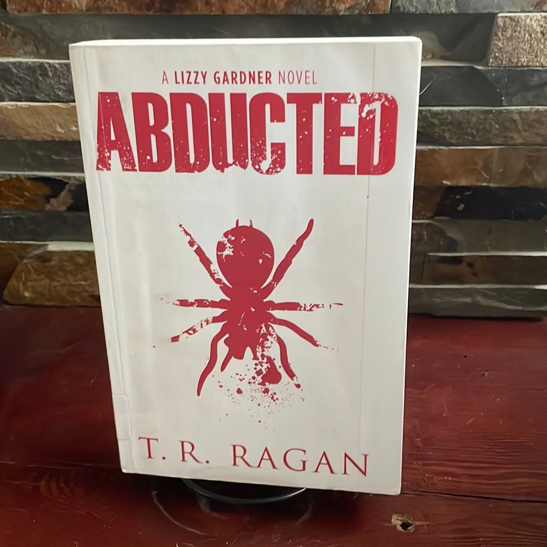 Abducted by T. R. Ragan