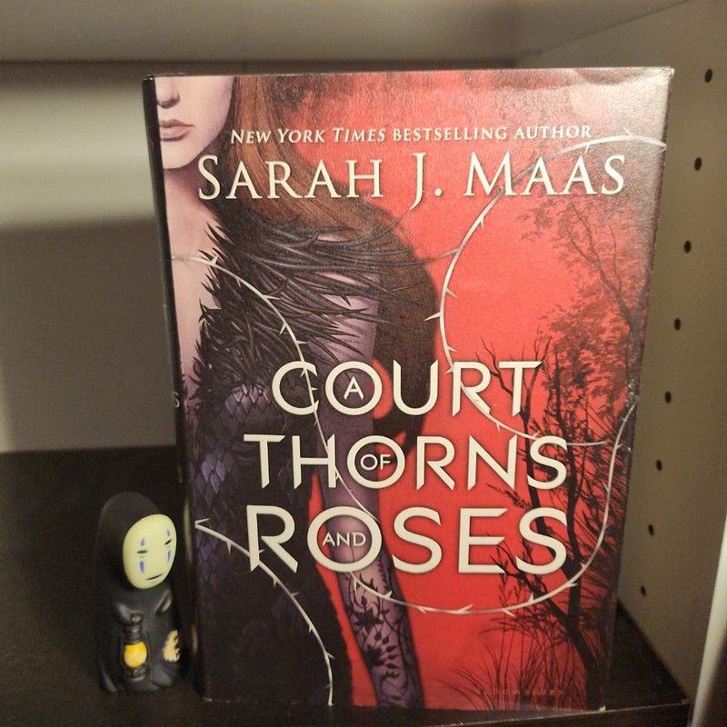 A Court of Thorns and Roses ( First Edition) 