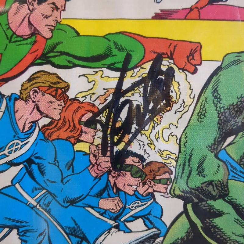 1986 signed The Offical Handbook of the Marvel Universe Deluxe Edition 