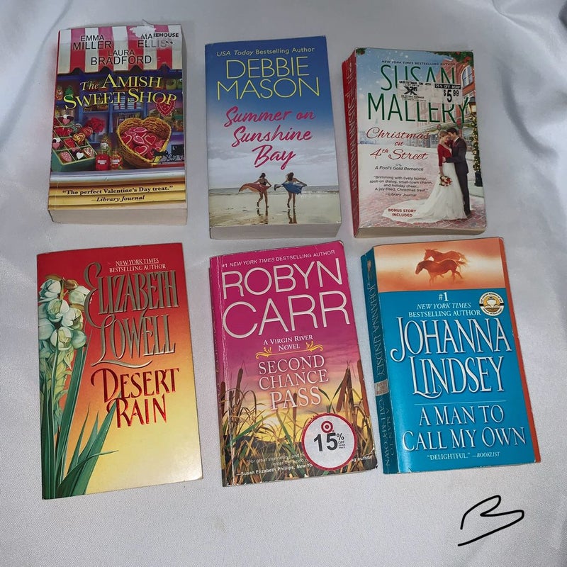 Lot of 6 pocket paper back books, by varied author, novels,romantic  fiction.