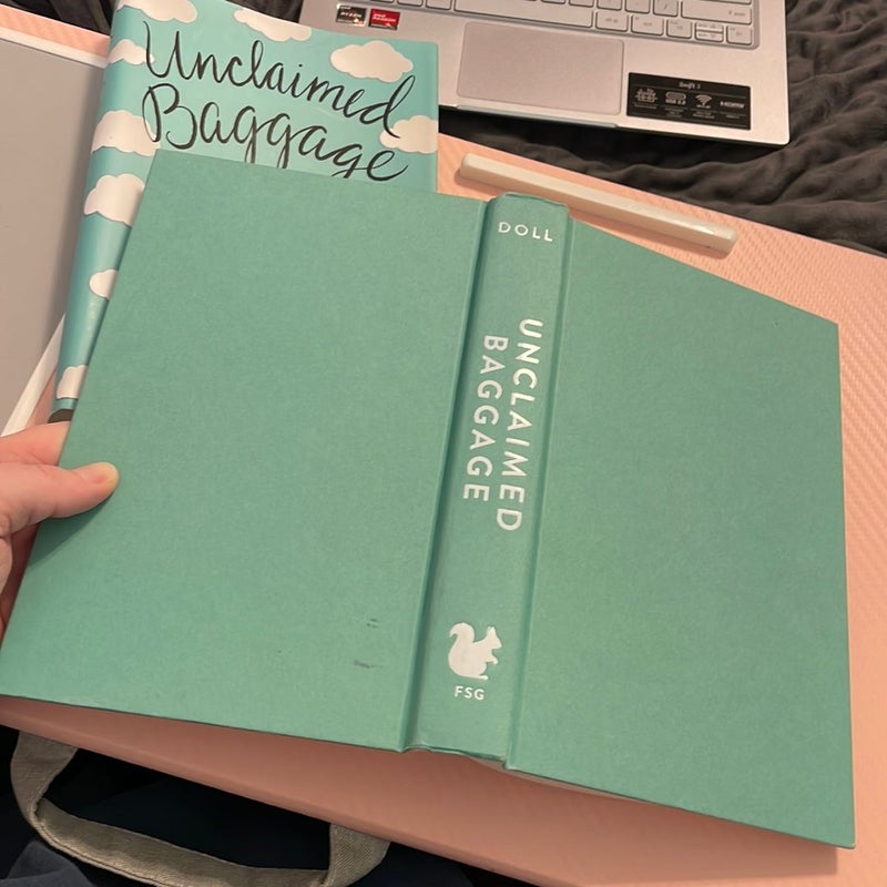 Signed! Unclaimed Baggage