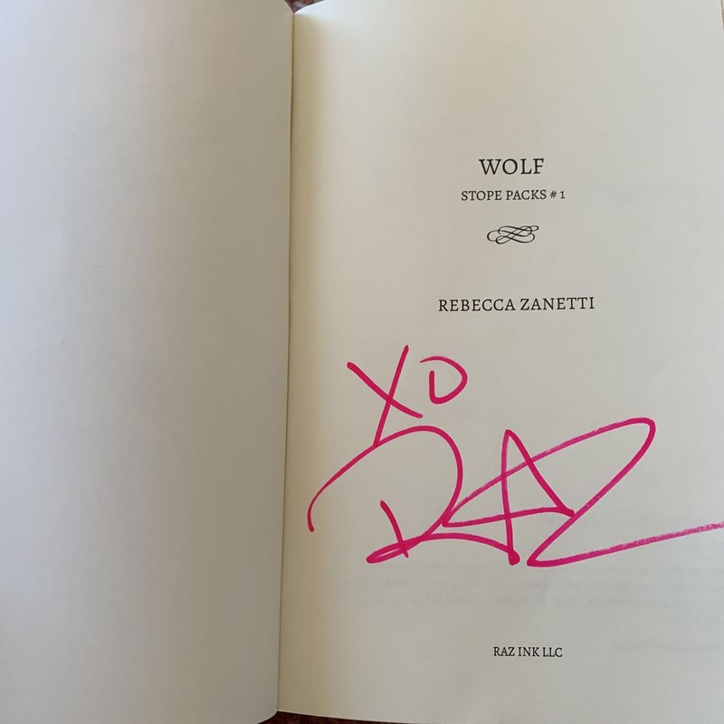 WOLF (Signed)