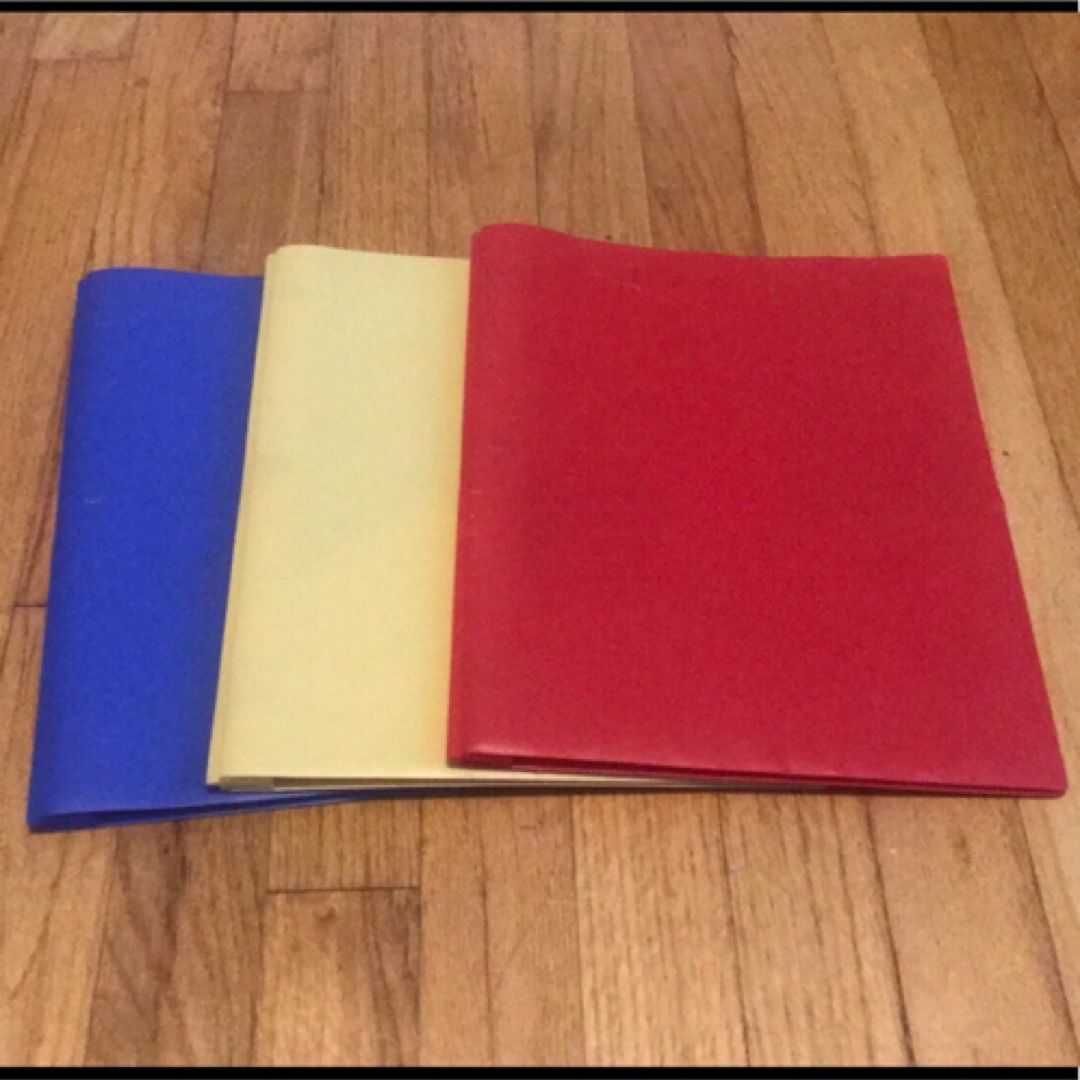 Lot of 3 plastic folders- red, yellow, blue
