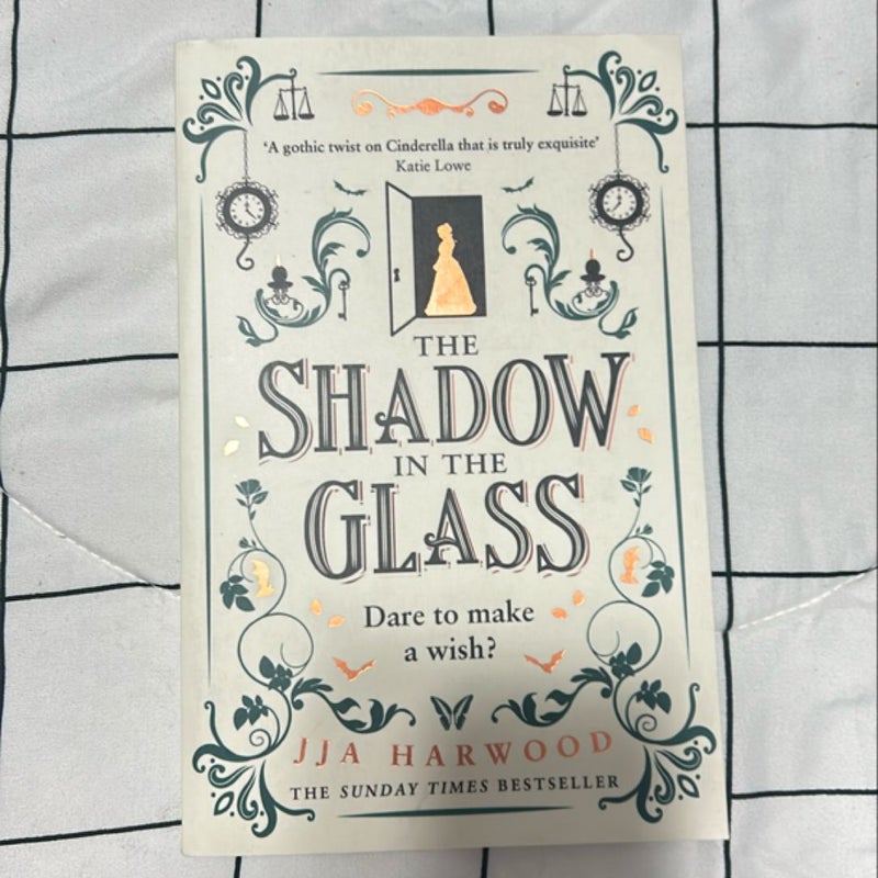 The Shadow in the Glass