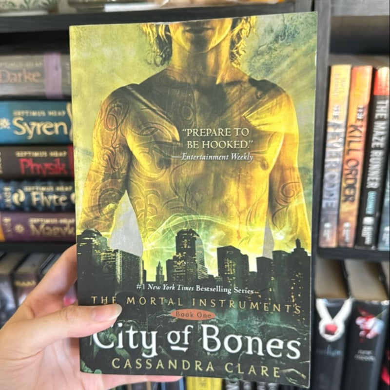 City of Bones, City of Ashes, City of Glass, City of Fallen Angels, AND City of Lost Souls