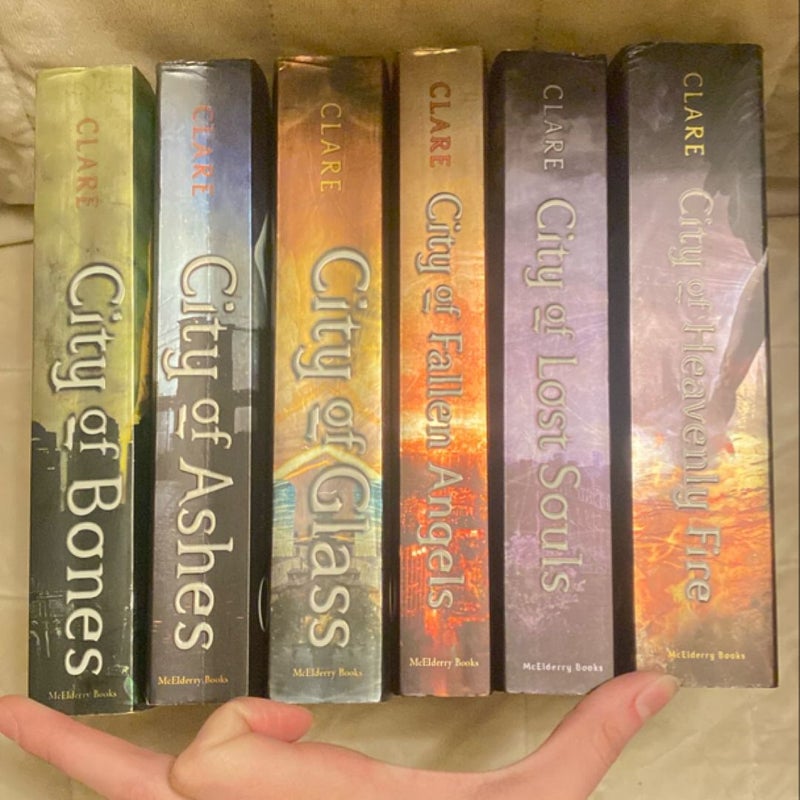 City of Bones/City of Ashes/City of Glass/City of Fallen Angels/City of Lost Souls/City of Heavenly Fire