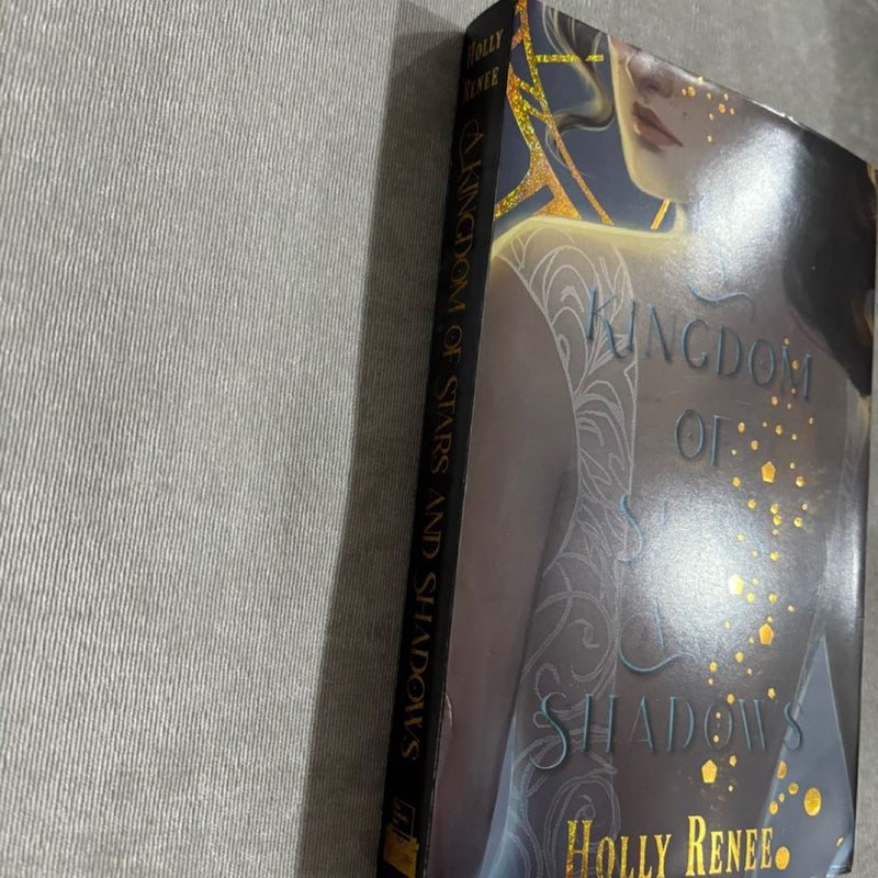 A kingdom of stars and shadows  SIGNED