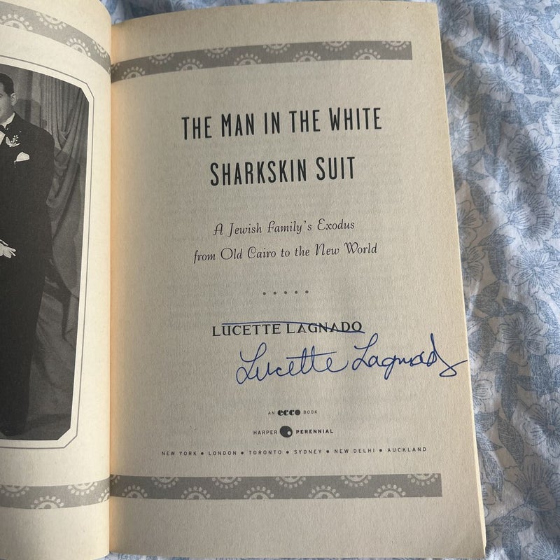 The Man in the White Sharkskin Suit