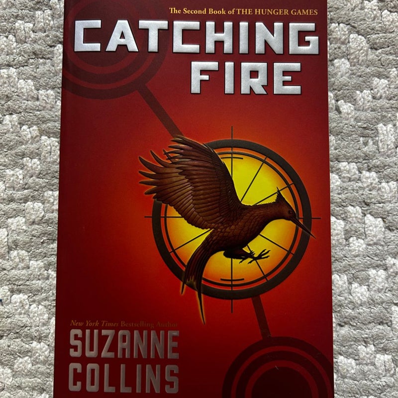 Catching Fire by Suzanne Collins, Scholastic, Paperback - Anobii