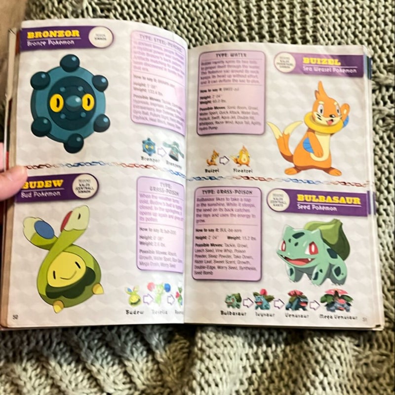 Pokemon gotta catch them all. Deluxe essential handbook.