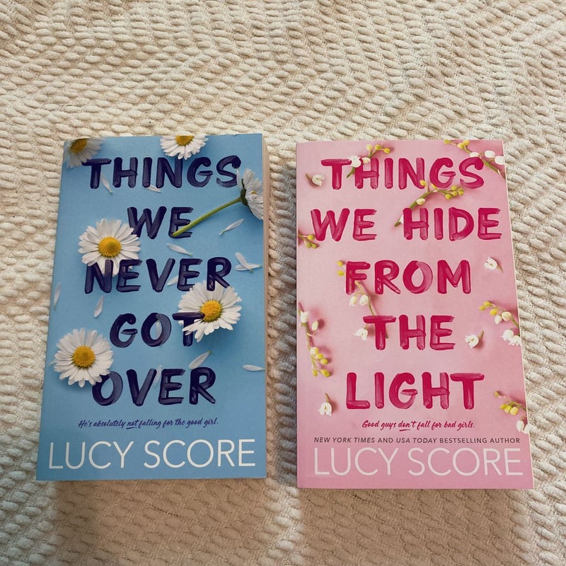  Things We Never Got Over: 9781638087137: Score, Lucy: Books