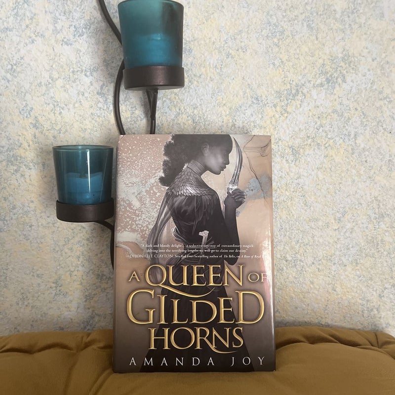 A Queen of Gilded Horns
