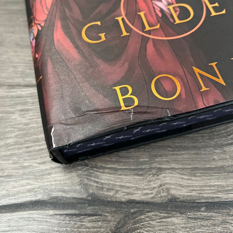 The Crown of Gilded Bones (Bookish Box signed - DAMAGED)