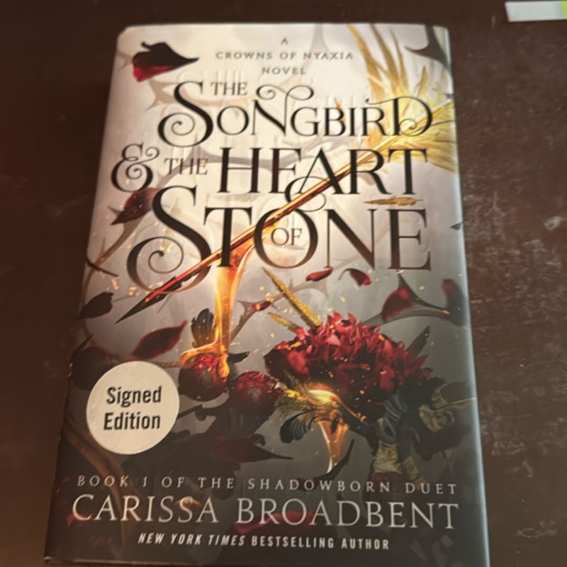 The Songbird and the Heart of Stone SIGNED (1st edition)