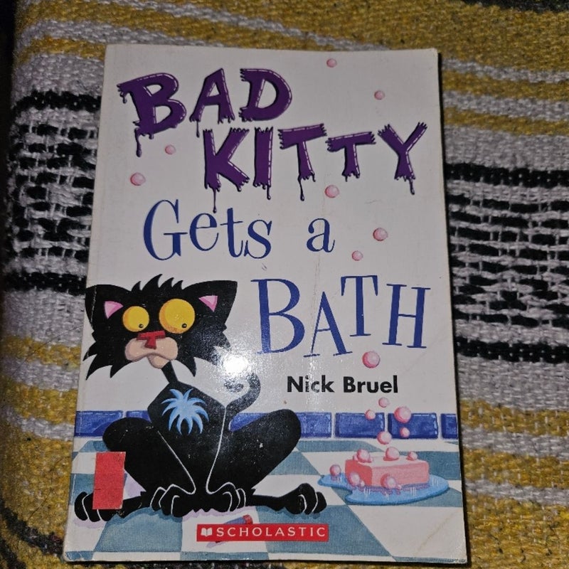 Bad kitty gets a bath