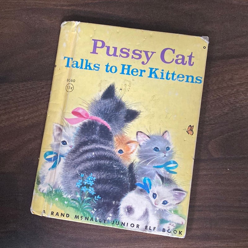 Pussy Cat Talks to Her Kittens