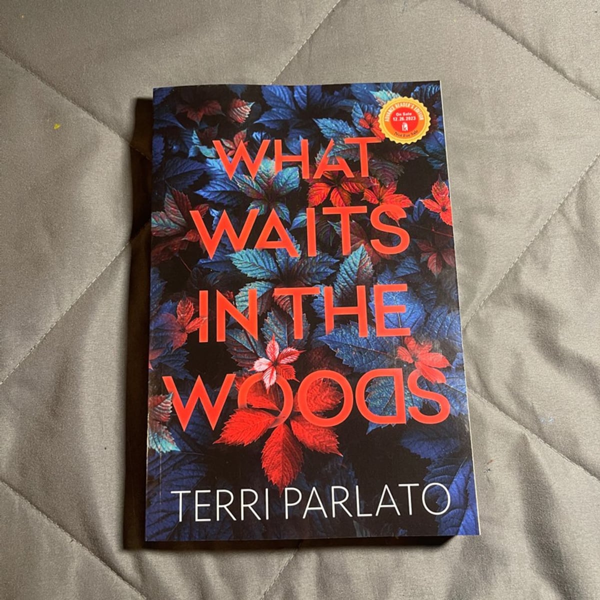 What Waits in the Woods ARC by Terri Parlato, Paperback