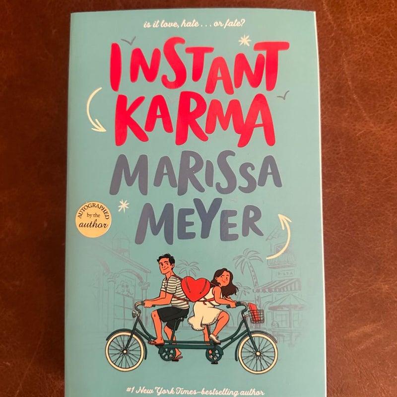 Instant karma signed by Marissa Meyer