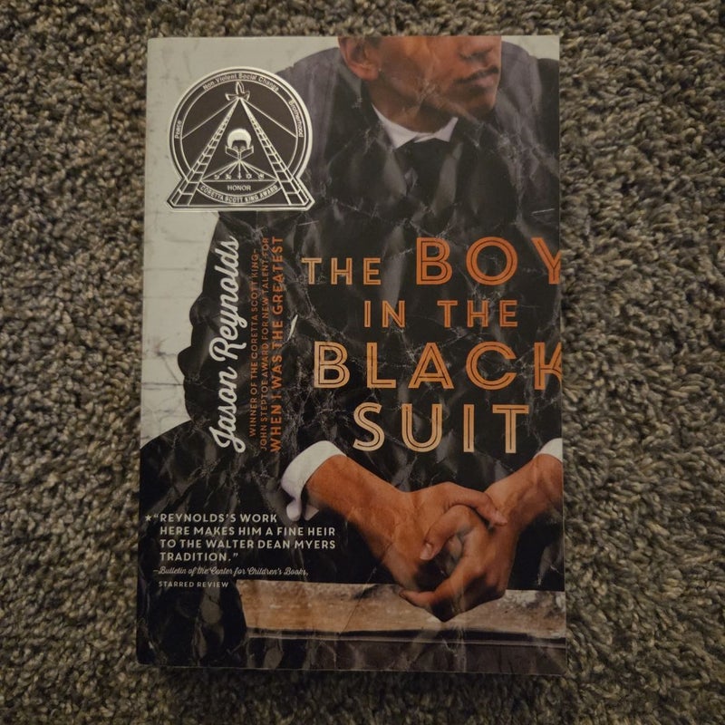 The Boy in the Black Suit