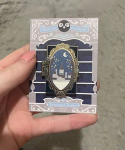Spinning Silver Treasured Tombs pin Owlcrate