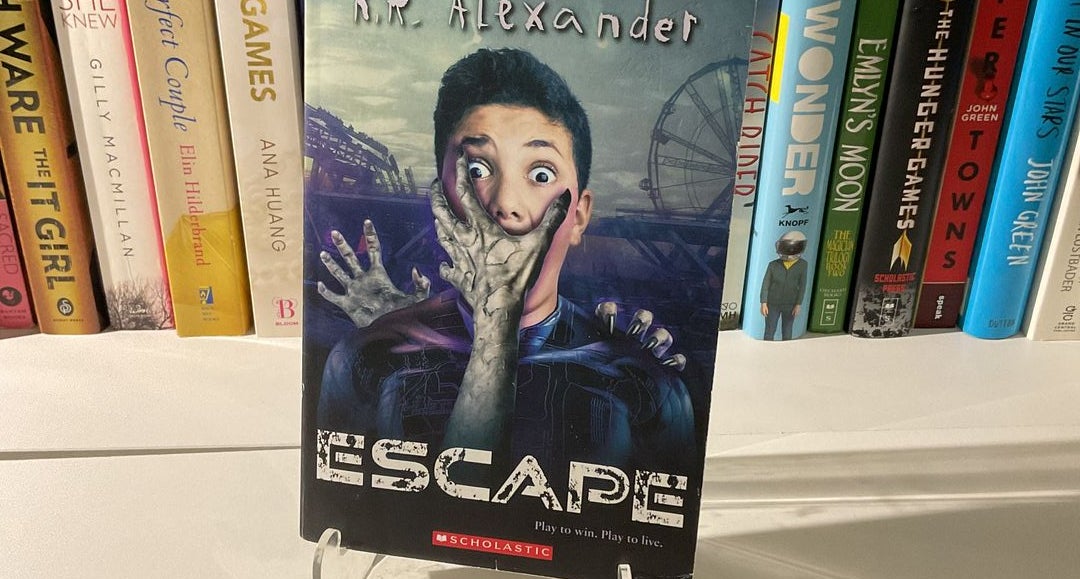 Escape: Alexander, K. R.: 9781338260472: : Books