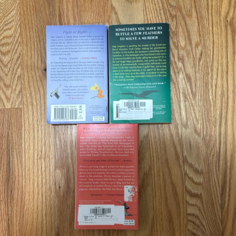 Lot of 2  paperback mystery books by author Donna Andrews