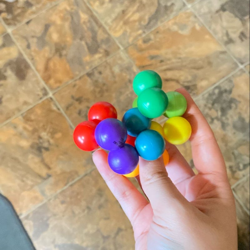 Rainbow fidget toy. 