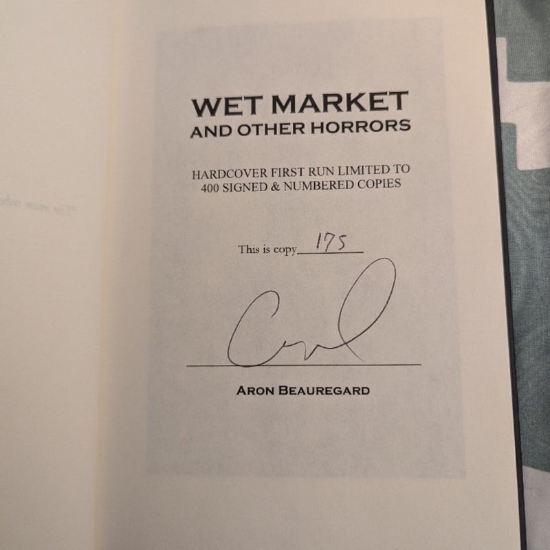 Wet Market (signed edition with bookmark and magnet)