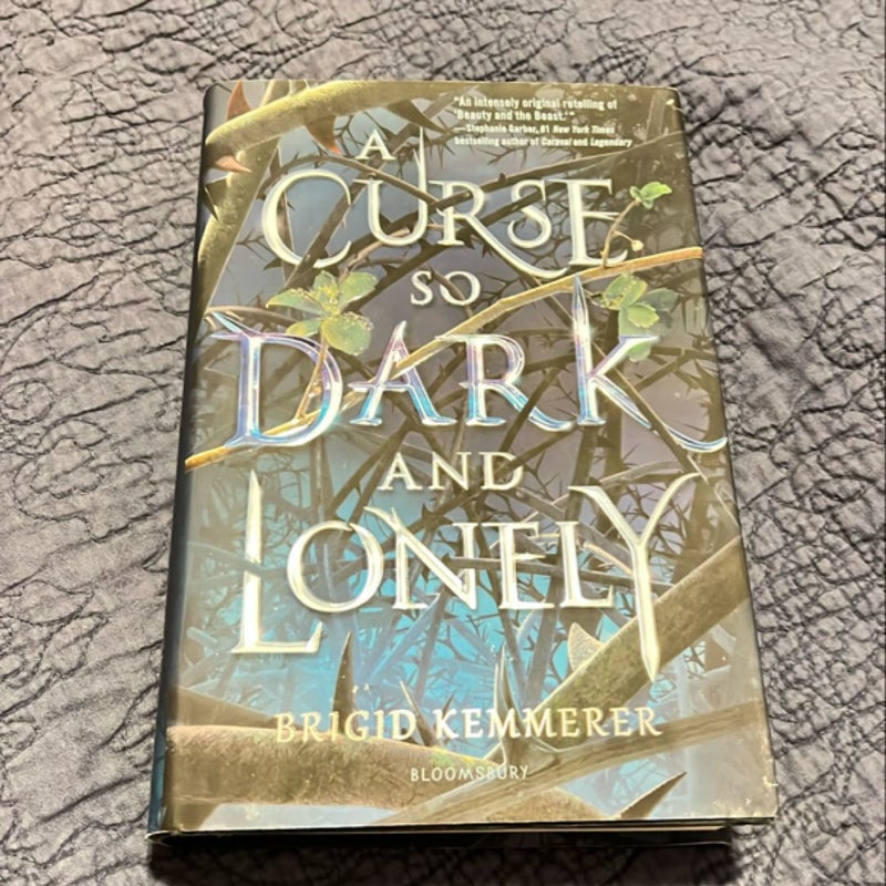 SIGNED TO AMANDA: A Curse So Dark and Lonely w/bookmark