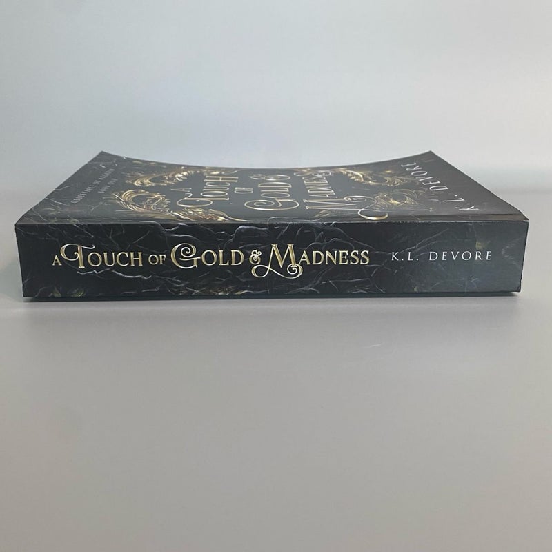 A Touch of Gold and Madness