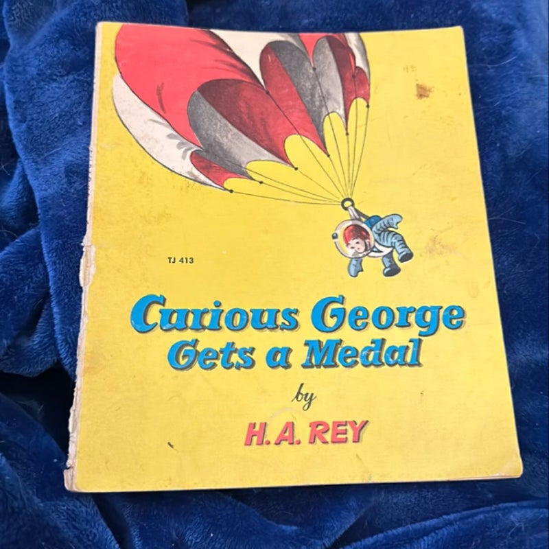 Curious George Gets A Medal 