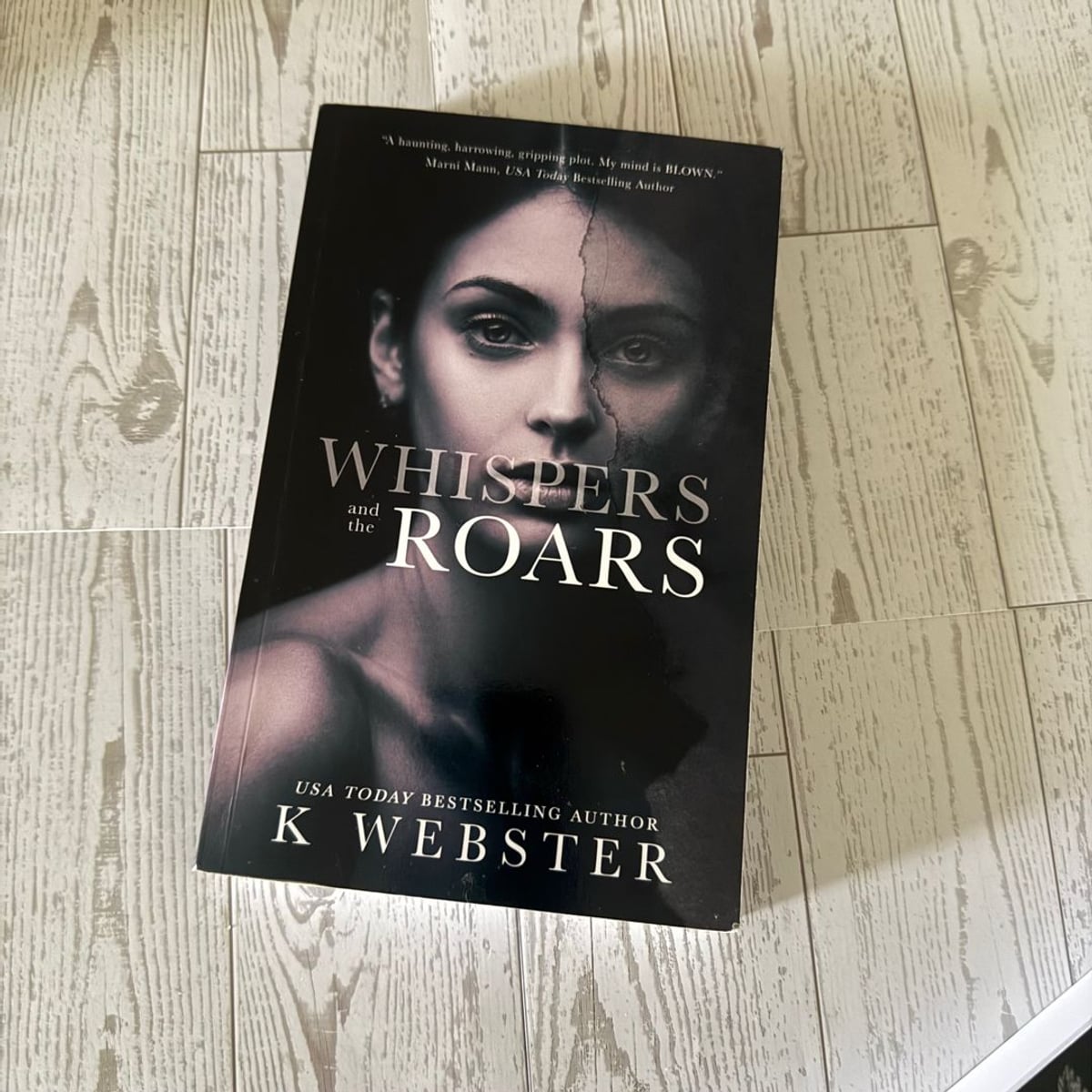 Whispers and the Roars by K. Webster