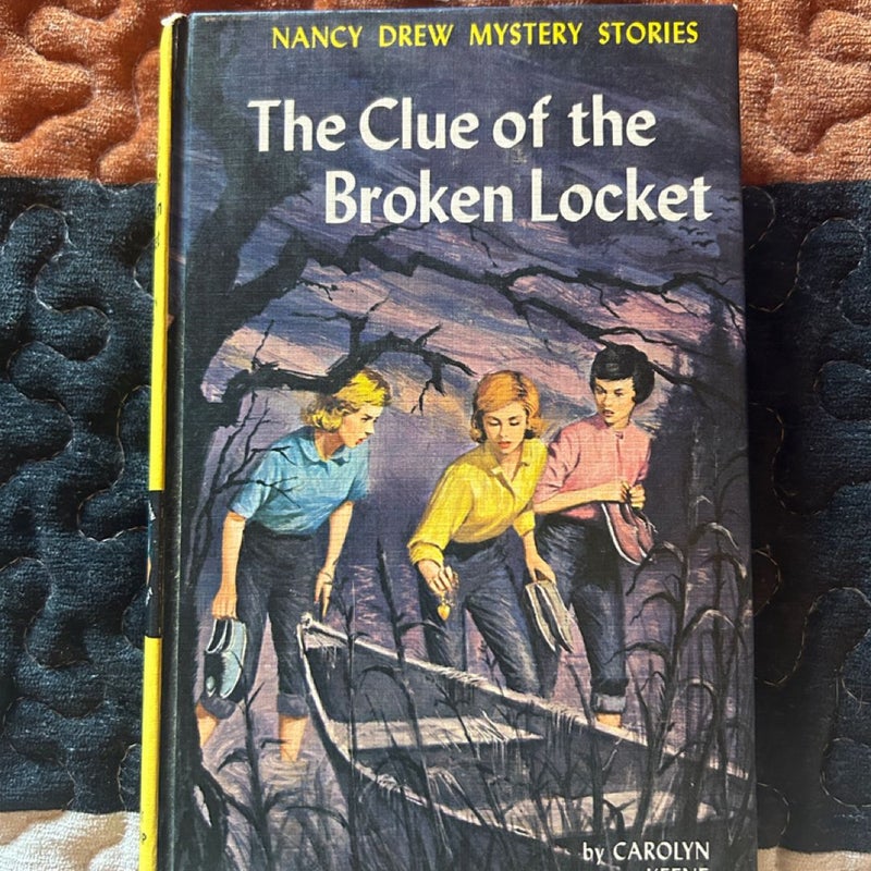 The Clue of the Broken Locket